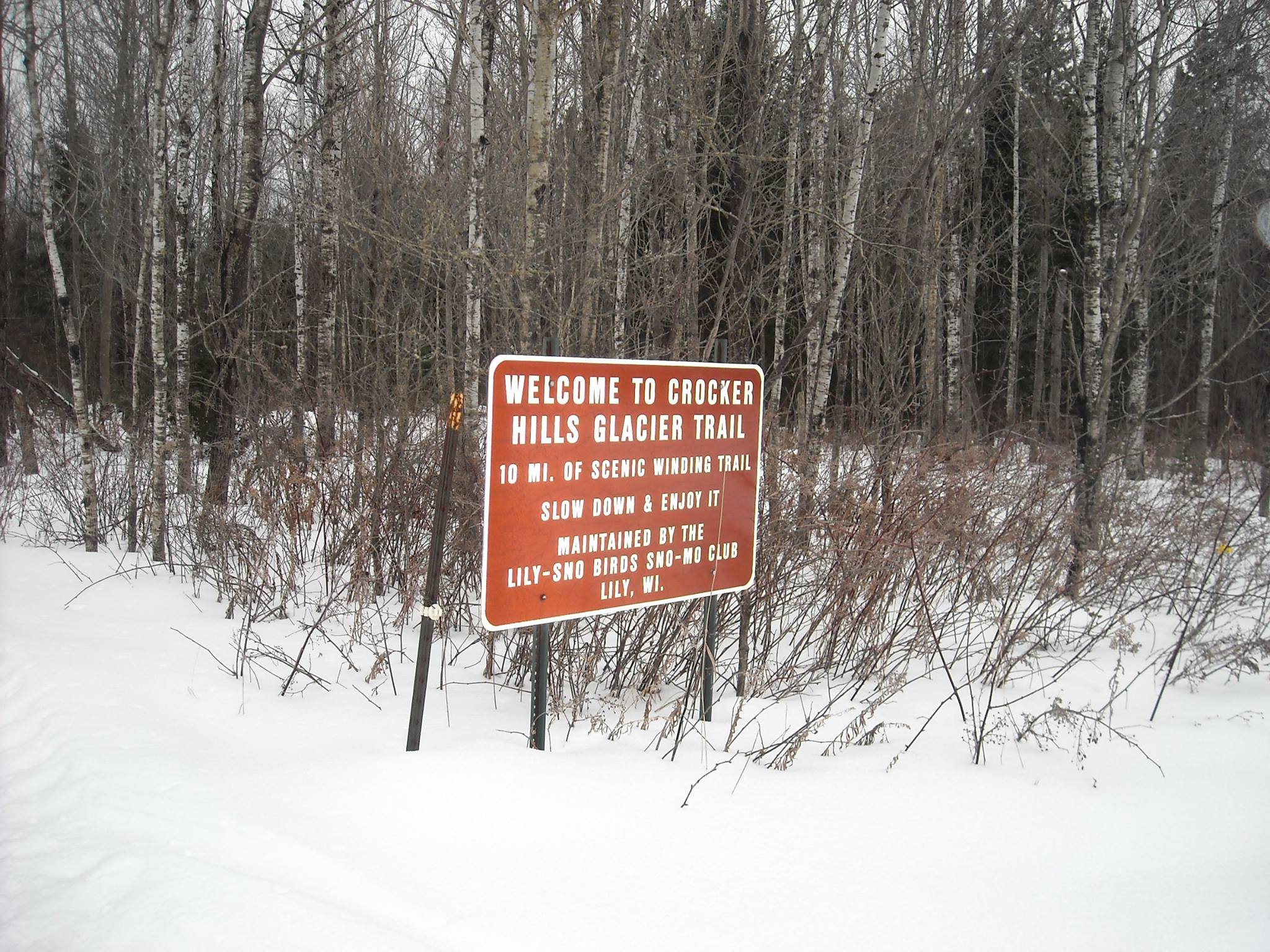 Slow down and enjoy nature while snowmobiling in the Crocker Hills Glacier Trail!