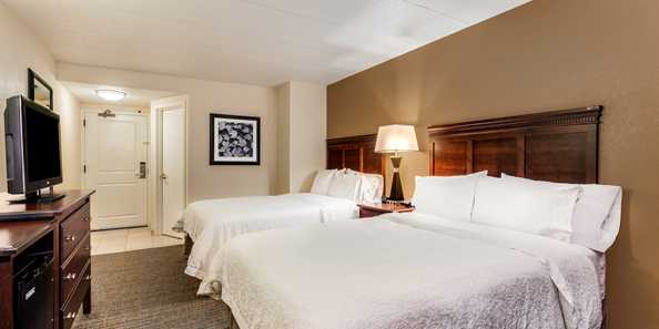 Relax in the Double Bed room with two clean and fresh Hampton beds&#174;.
