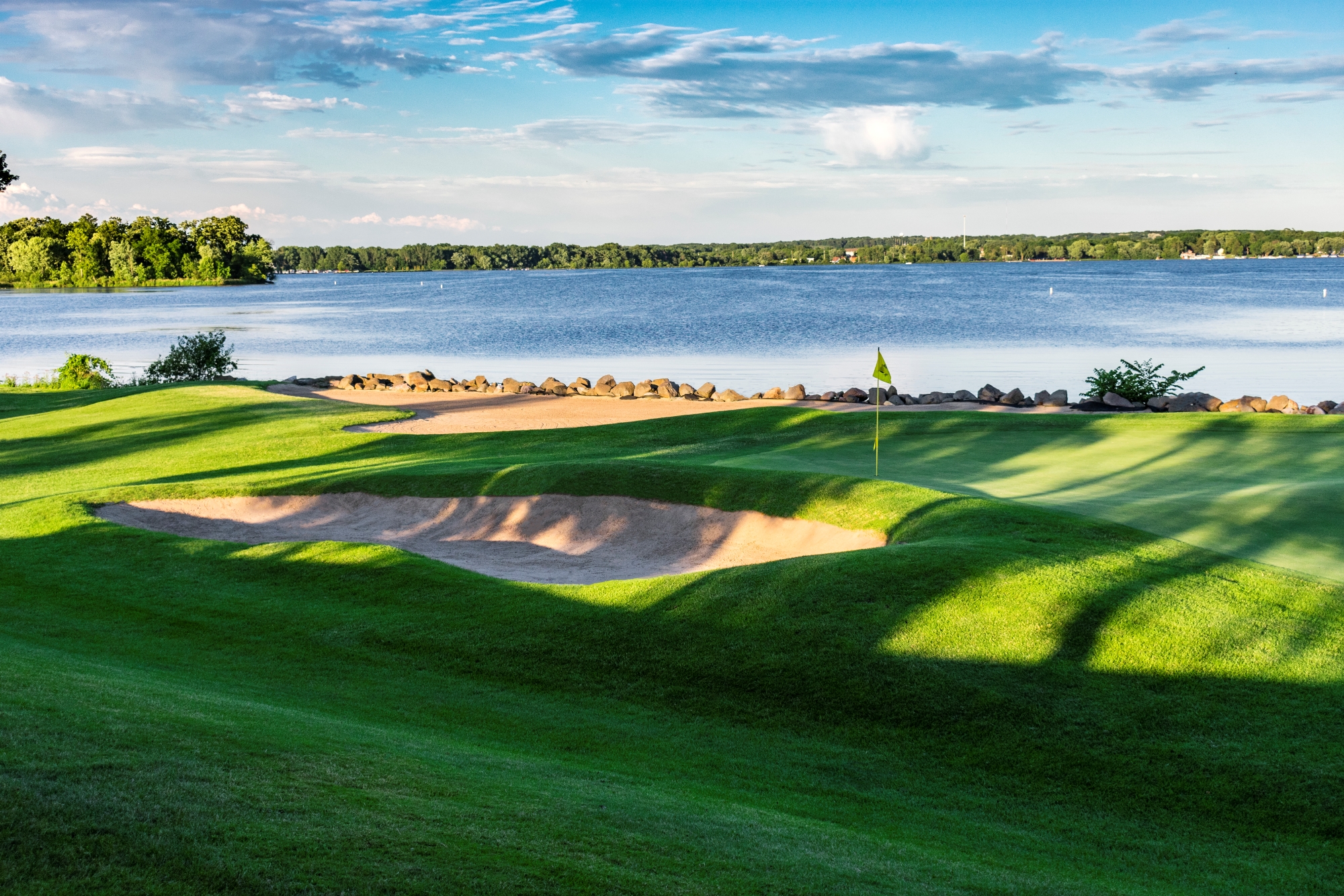Green along the shoreline at Majestic Oaks Golf Course.