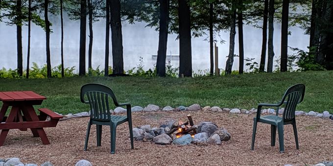 Guests share our yard, firepit, lake, boats, swim pad and dock, porch, picnic table and grill.