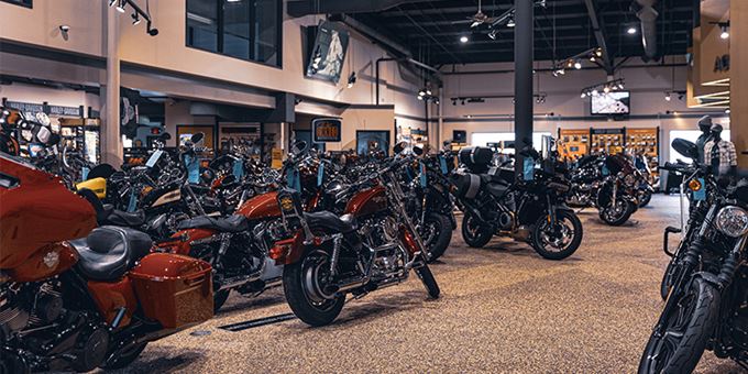 Showroom floor filled with assortment of motorcycles at Harley-Davidson of Madison
