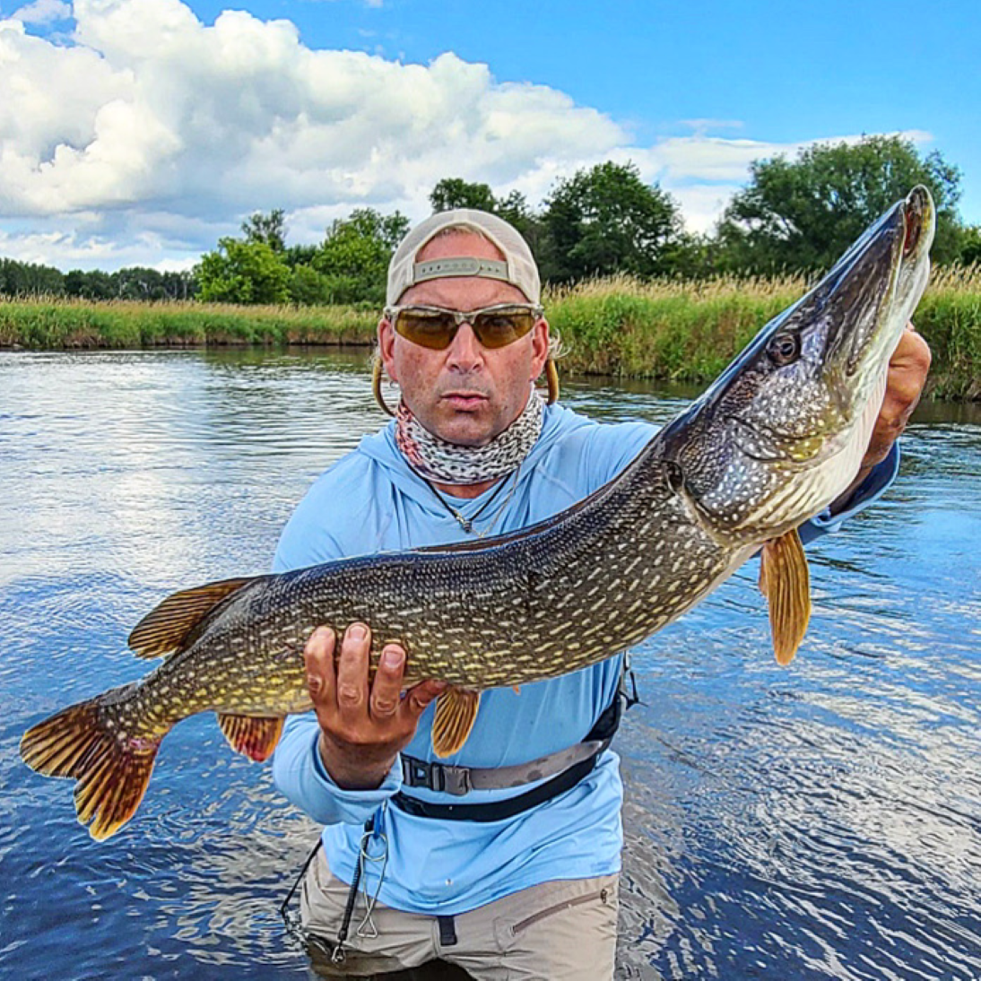 Fisherman holding his catch